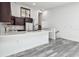 Modern kitchen with a center island, white countertops, and stainless steel appliances at 6343 92Nd N Pl # 2102, Pinellas Park, FL 33782