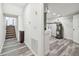 Finished laundry room with gray floors and neutral walls, located by the stairs at 6343 92Nd N Pl # 2102, Pinellas Park, FL 33782