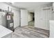 Finished laundry room with water heater, and access to garage and basement area at 6343 92Nd N Pl # 2102, Pinellas Park, FL 33782