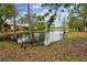A peaceful view of the tranquil pond on this property creates a serene and natural backdrop at 6343 92Nd N Pl # 2102, Pinellas Park, FL 33782