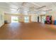 Spacious recreation room features high ceilings and multiple ceiling fans for maximum comfort at 6343 92Nd N Pl # 2102, Pinellas Park, FL 33782