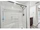A standing shower features sleek fixtures with new fixtures, including a full vanity in the attached bathroom at 6343 92Nd N Pl # 2102, Pinellas Park, FL 33782