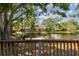 Scenic water view framed by lush trees and landscaping on a bright, sunny day at 6343 92Nd N Pl # 2102, Pinellas Park, FL 33782