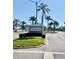Entrance to Bardmoor community with prominent sign and lush tropical landscape at 717 Cordova Green, Seminole, FL 33777