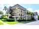 Charming condominium featuring multiple stories and private balconies at 717 Cordova Green, Seminole, FL 33777