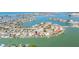 Aerial view of waterfront real estate in a prime coastal neighborhood at 728 Pruitt Dr, Madeira Beach, FL 33708