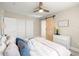 Bedroom featuring a sliding barn door, and standard closet doors at 728 Pruitt Dr, Madeira Beach, FL 33708