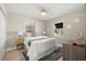 Comfortable bedroom with light walls and two windows for natural light at 728 Pruitt Dr, Madeira Beach, FL 33708