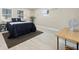 Cozy bedroom with light wood floors, neutral walls and furnishings at 728 Pruitt Dr, Madeira Beach, FL 33708