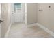 Clean, functional laundry room with easy outdoor access at 728 Pruitt Dr, Madeira Beach, FL 33708