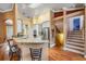 Open concept kitchen features granite counters, stainless appliances, and a breakfast bar at 8425 Jackson Springs Rd, Tampa, FL 33615
