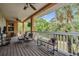 Relaxing covered patio with scenic views, perfect for outdoor seating and enjoying the natural surroundings at 8425 Jackson Springs Rd, Tampa, FL 33615