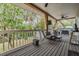 Covered porch with views of the river and lush foliage at 8425 Jackson Springs Rd, Tampa, FL 33615