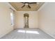 A spacious main bedroom featuring carpeted floors, neutral walls and abundant natural light at 1038 Emerald Dunes Dr, Sun City Center, FL 33573