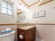 Bathroom with a granite vanity, light fixtures, and mosaic tile backsplash at 1140 81St S St, St Petersburg, FL 33707