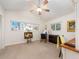 Sunny bedroom with a vaulted ceiling, fan, and multiple windows providing plenty of natural light at 1140 81St S St, St Petersburg, FL 33707