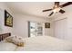 Bright bedroom featuring French doors leading to the pool area, enhancing indoor-outdoor living at 1140 81St S St, St Petersburg, FL 33707