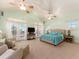 Spacious Primary bedroom with ceiling fans, natural light and private access to the outdoor area at 1140 81St S St, St Petersburg, FL 33707