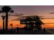 Evening shot of a famous waterfront attraction offering dining and great views at 12924 Gulf Blvd # 310, Madeira Beach, FL 33708