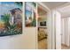 Inviting bedroom view showing tropical decor and access to the adjoining bathroom at 12924 Gulf Blvd # 310, Madeira Beach, FL 33708