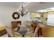The dining area seamlessly adjoins the kitchen and features seating for four at 12924 Gulf Blvd # 310, Madeira Beach, FL 33708