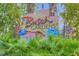 Close up of the entrance sign for Busch Gardens, tropical plants surround this very colorful sign on a sunny day at 12924 Gulf Blvd # 310, Madeira Beach, FL 33708
