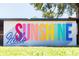A colorful mural with the words 
