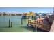 Charming waterfront restaurant and bar featuring outdoor seating and picturesque views of the water at 12924 Gulf Blvd # 310, Madeira Beach, FL 33708