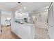 Modern kitchen with white cabinets, sleek countertops, and stainless steel appliances at 1318 Moreland Dr # 108, Clearwater, FL 33764