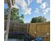 Fenced backyard showing a wooden fence and a corner for plants or a garden at 1329 Tuscola St, Clearwater, FL 33756