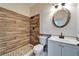 Well-appointed bathroom featuring decorative tile work in the shower and updated vanity at 14807 Capps Estates Ln, Wimauma, FL 33598