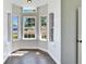 Cozy breakfast nook filled with natural light from large windows at 14807 Capps Estates Ln, Wimauma, FL 33598