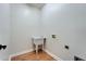 Practical laundry room with a utility sink and ample space for appliances at 14807 Capps Estates Ln, Wimauma, FL 33598
