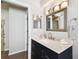 Bathroom featuring modern vanity with marble countertop and decorative elements at 15018 Greeley Dr, Tampa, FL 33625