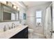 Full bathroom includes modern fixtures and decor at 15018 Greeley Dr, Tampa, FL 33625