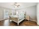 Bedroom boasts a decorative ceiling fan and private patio entrance at 15018 Greeley Dr, Tampa, FL 33625