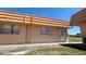 Charming single-story villa with a light orange brick facade, featuring an unique roof, and well-kept landscaping at 1801 Bedford Ln # 46, Sun City Center, FL 33573