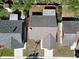 An aerial view displays the property's layout, including the roof, yard, and surrounding neighborhood at 2033 Shadow Pine Dr, Brandon, FL 33511