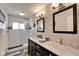 Contemporary bathroom boasting double vanity, modern fixtures, and a tiled shower at 2033 Shadow Pine Dr, Brandon, FL 33511