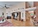 Open-concept living room with a fireplace and views into the dining area at 2033 Shadow Pine Dr, Brandon, FL 33511