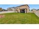 Large backyard with a well-maintained lawn and privacy fence, ideal for outdoor activities and gatherings at 21832 Crest Meadow Dr, Land O Lakes, FL 34637