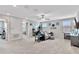 Versatile bonus room featuring a comfortable seating area and a workspace at 21832 Crest Meadow Dr, Land O Lakes, FL 34637