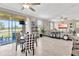 Bright dining area features a sliding glass door leading to an outdoor patio at 21832 Crest Meadow Dr, Land O Lakes, FL 34637