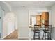 Breakfast bar featuring granite countertops and a view into the updated kitchen at 2362 Mary Ln, Clearwater, FL 33763