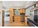 Updated kitchen with stainless steel appliances, stone countertops, and modern cabinets at 2362 Mary Ln, Clearwater, FL 33763