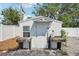 The backyard shed offers extra storage and workspace, perfect for hobbies or gardening at 2362 Mary Ln, Clearwater, FL 33763