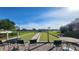 Bocce court with outdoor seating at the community center in a landscape setting at 2401 Richmond Greens Ct, Sun City Center, FL 33573