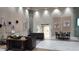 Elegant lobby area with contemporary furnishings, artwork, and easy access to the Veterans Theater at 2401 Richmond Greens Ct, Sun City Center, FL 33573