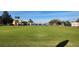 Shuffleboard courts with shade structures at the community center at 2401 Richmond Greens Ct, Sun City Center, FL 33573