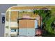 Top-down aerial view displaying the property's layout, yard, and proximity to streets at 2930 S Pines Dr # 109, Largo, FL 33771